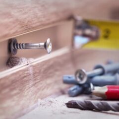 a screw in a wood frame