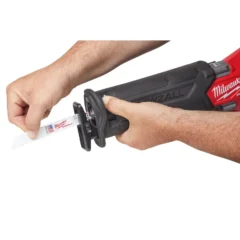 a man using a power tool